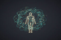 A luminous, stylized outline of a human figure standing upright, glowing with a soft golden light. The figure is enveloped by a dynamic, intricate sphere of intertwining, glowing lines and subtle dots in shades of blue-green and gold, set against a dark, muted background. The lines appear to be in motion, forming a complex, interconnected network around the central human form.